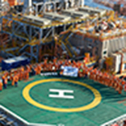 workers assembling on the helipad of an oil platform