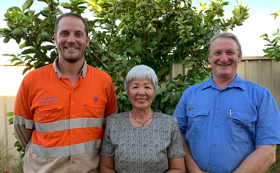 Wheatstone Supply Chain Superintendent Tom Jeffreys and Onslow Bus & Taxi owners Emily See and Neil Rafferty.