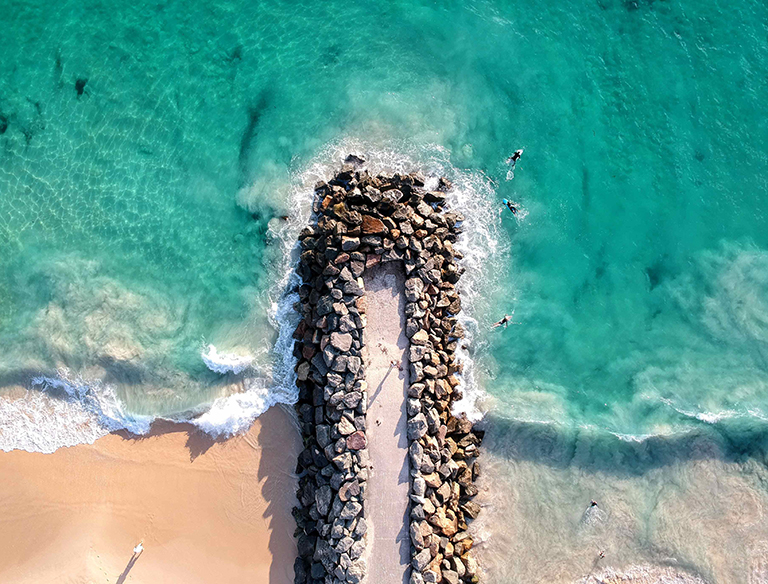 City Beach - Perth's Finest: One of Perth's most iconic locations (City Beach), is protected against wave erosion by a series of rock barriers known as groynes, preserving WA's coastline.