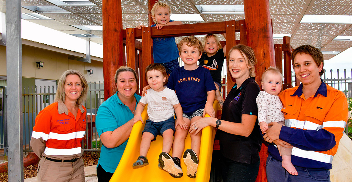 Chevron Wheatstone , One Tree Community Services Onslow and BHP staff with young Onslow residents in playground