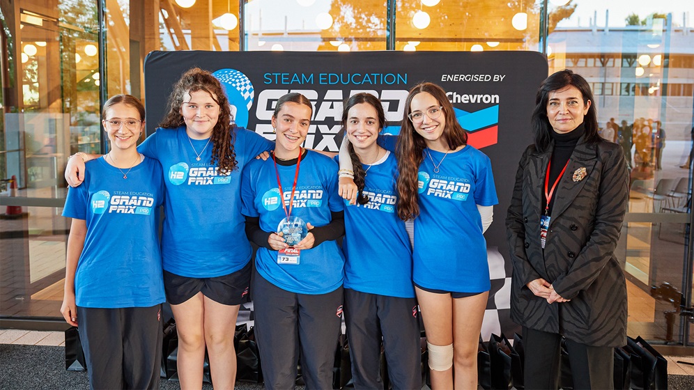 Professor Parisa Bahri, Pro Vice Chancellor and Head College of Science, Technology, Engineering and Mathematics at Murdoch University, presents first place all-girls team “Speedy Gonzales” from Belridge Secondary College - who have been invited to compete at the World Finals as part of the competition’s new Girls in STEM initiative.
