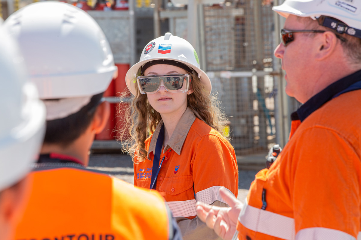 Staff in PPE as students experience Chevron-operated Wheatstone with RTS On Tour