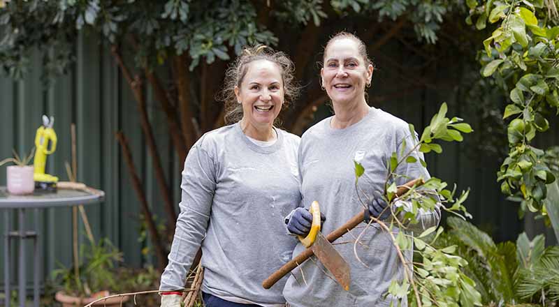 Members of Chevron Australia's Women Network doing volunteer gardening work at a Zonta House refuge.