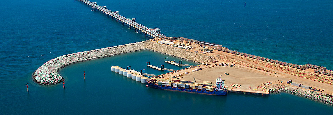 An aerial view of the LNG Jetty looking back towards the Materials Offloading Facility and plant site on Barrow Island.